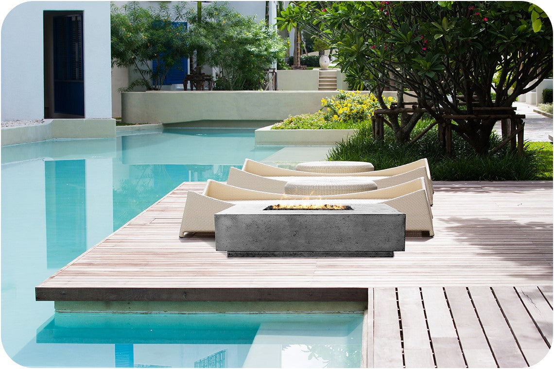 Lifestyle Image of the Tavola 4 Concrete Fire Table